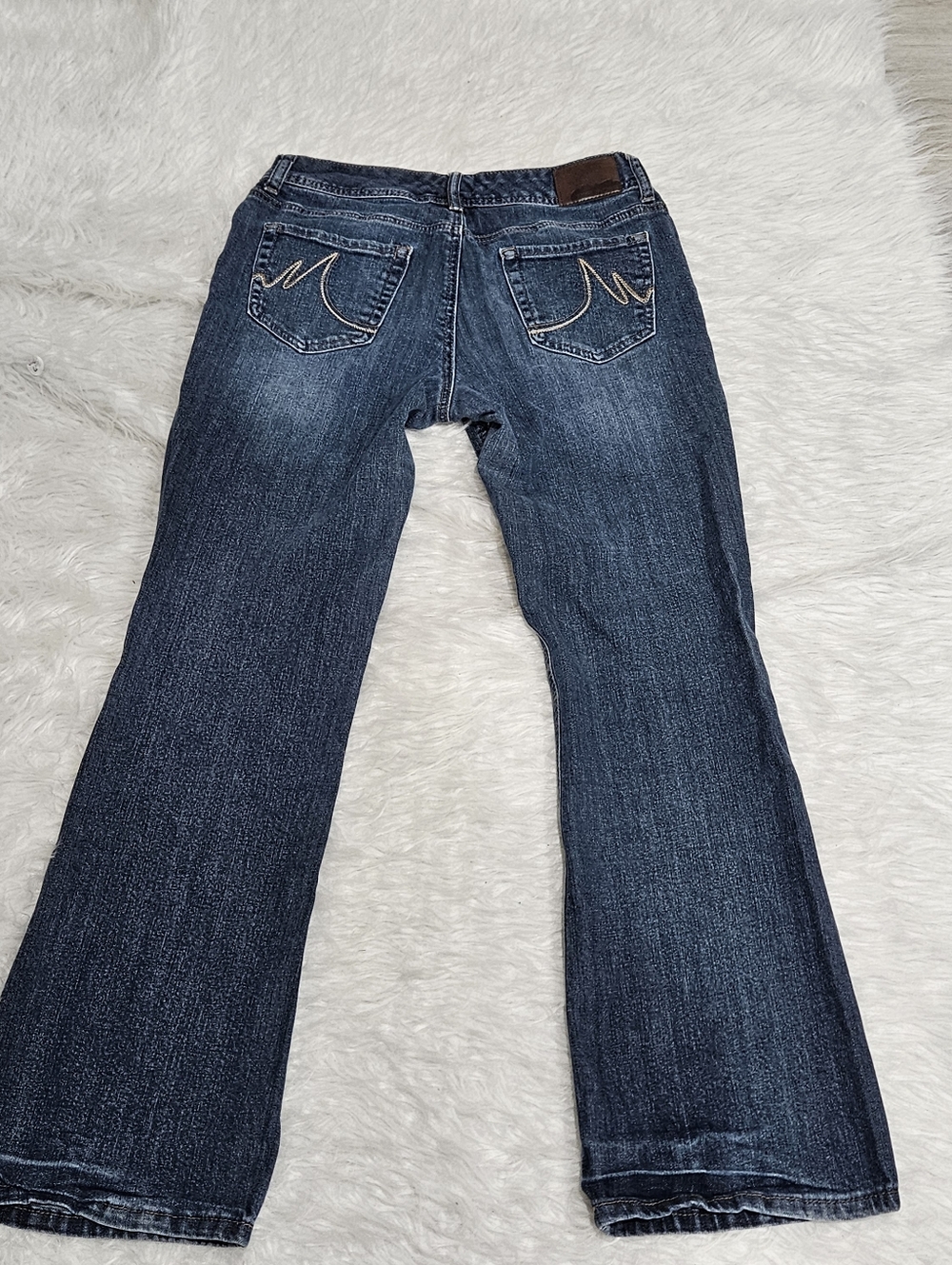 Maurices Dark Blue Flare Jeans with Embroidered Back Pockets